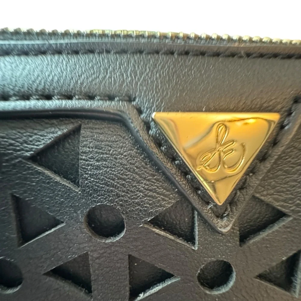Sam Edelman Faux Leather Black and Silver Eyelet Wristlet Bag